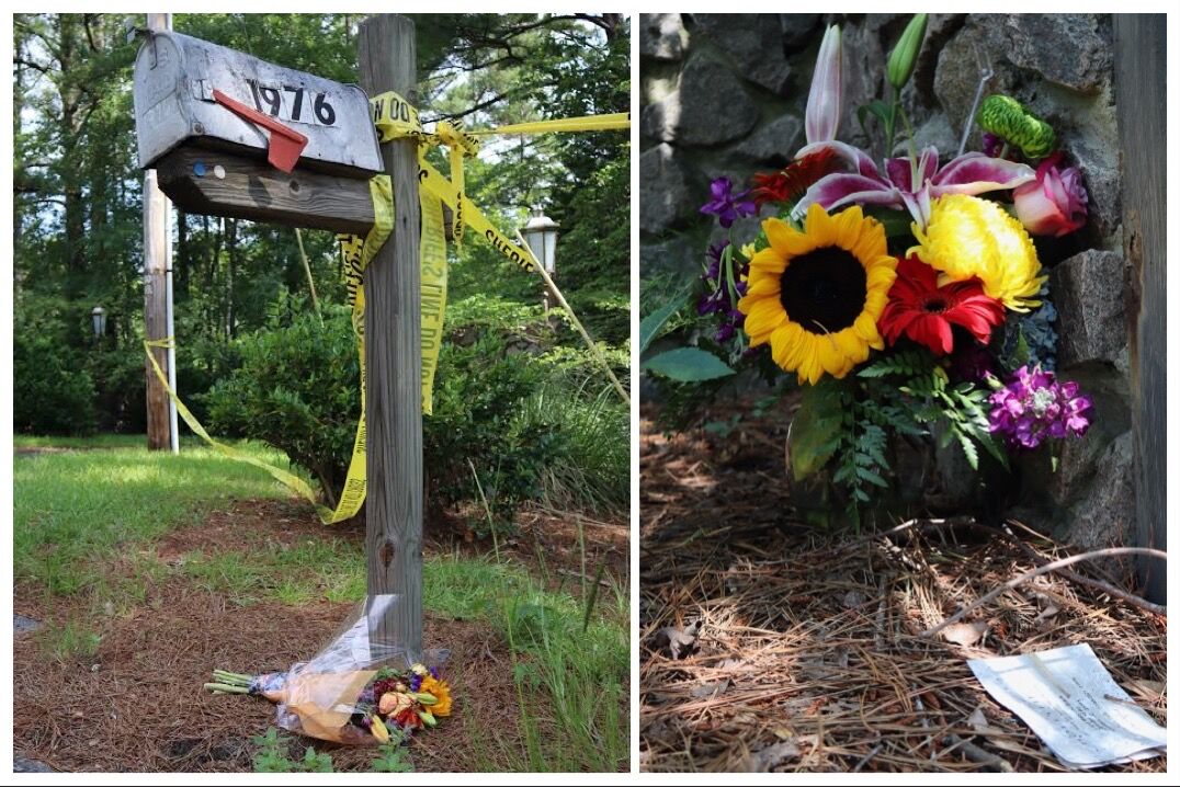Flowers left by mourners in front of the Blacks' home.
